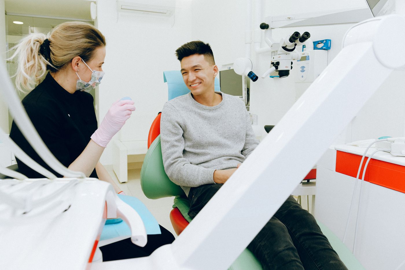 Dentist caring for a patient at Dr. Mutha's Dental